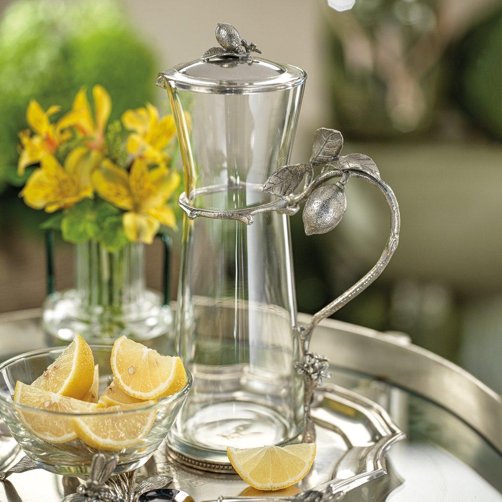 A LIMON AGRIA PEWTER AND GLASS PITCHER WITH LID
